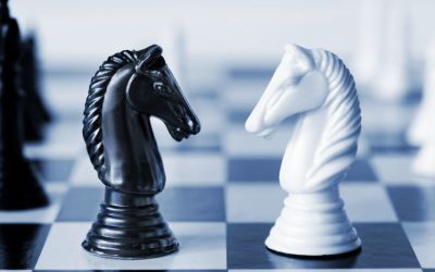 Chess pieces; God vs. Satan.